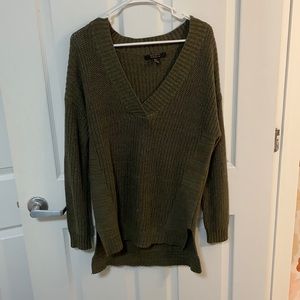 Green v-neck sweater
